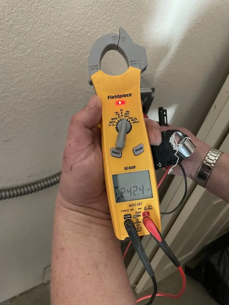 Voltage testing with clamp meter during Aluminum Wiring Replacement in Timberlane